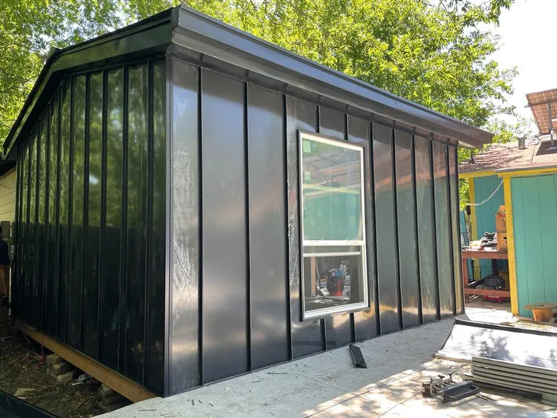 Black standing seam metal wall panels for Roof Inspection in Wellington